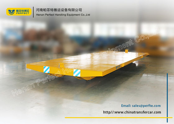 Yellow no - powered tow tailer for industrial assembly line with moving platform