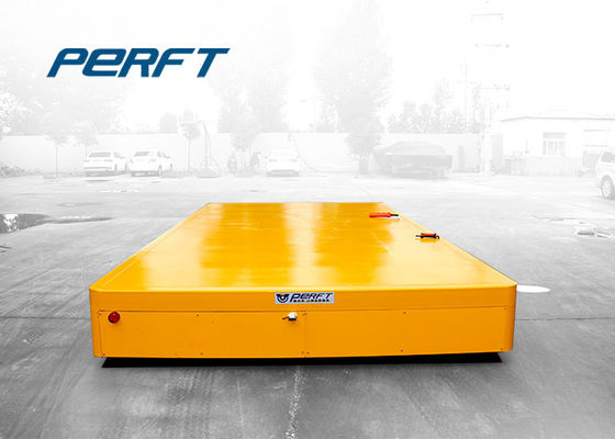industrial using electric trackless transfer cart to transport heavy material